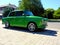 Vintage East German made restored green small two stroke car in side view