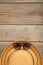 Vintage fabricate straw hat and sunglasses on grey wooden background