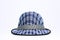 Vintage, felt trilby/fedora hat with plaid blue pattern on a white background.