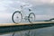 Vintage female bicycle on the background of the sea and the rain