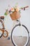 vintage female bicycle flowers basket closeup