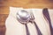Vintage filter : Close up spoon,fork,knife on dinner table