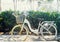 Vintage filtered: Bicycle parking in house outdoor, classic bike in the garden