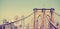 Vintage filtered panoramic picture of Brooklyn Bridge.