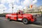 Vintage fire trucks parade in front of Palace of Parliament