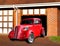 vintage ford anglia car on driveway