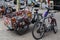 Vintage funny three wheels cargo bike parked in the street.