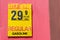 Vintage gas station price sign advertising pre-inflation gasoline prices