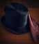 Vintage gentleman`s top hat with a cravat