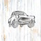 Vintage german car on wooden background