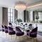Vintage Glamour: A glamorous dining room with a crystal chandelier, velvet dining chairs, and a mirrored accent wall4, Generativ