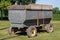 Vintage gray metal grain wagon farm implement