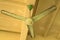 Vintage green ceiling fan on ceiling. Old ceiling fan with rust