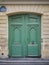 Vintage green doors in Paris, France