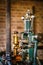 Vintage green and gold steam engine with three valves