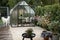 Vintage greenhouse in backyard