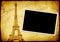 Vintage grunge background with old paper texture and Eiffel Tower