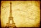 Vintage grunge background with old paper texture and Eiffel Tower