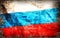 Vintage grunge filtered,Russia flag on brick.