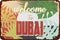 Vintage grunge retro sign welcome to dubai