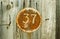 Vintage grunge square metal rusty plate of number of street address with number 37 closeup