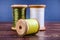 Vintage grunge three wooden threads spools