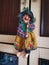 Vintage Halloween decoration witch hanging on the door