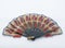 Vintage hand folding fan made of hand-decorated buffalo leather. Stick made of wood. Hand painted and decorated hand folding