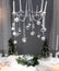 Vintage hanging candle chandelier decorated with silver and whit