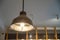 Vintage hanging lamp is in front of coffee counter. Copy space