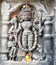 Vintage historic stone art of Indian Gods in an ancient Hindu Indian temple