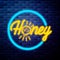 Vintage honey emblem glowing neon