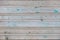 Vintage horizontal gray colour wooden boards with remains paint as background