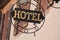 vintage hotel signage on metallic panel