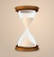 Vintage hourglass on beige background