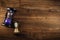 Vintage hourglasses sandglasses on the wooden table, top view.