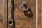 Vintage image of ancient door knocker on a wooden door