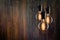 Vintage incandescent Edison type bulbs on wooden background