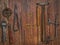 Vintage jeweler tools over wooden wall