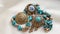 Vintage jewelry: beads, turquoise necklace, brooches with turquoise crystals.