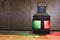 Vintage kerosene oil lantern on wooden floor