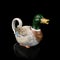 Vintage kettle shaped duck. retro teapot in the shape of a bird.