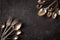 Vintage kitchen cutlery on stone table, top view