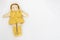 Vintage Knit Doll Yellow on White Background