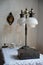 vintage lamp with two shades on the table in the room