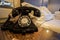 Vintage landline phone in bedroom luxury hotel