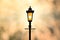 Vintage lantern post with sunset Background sillhouette