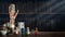 Vintage layout of a man`s hand, old medical glass bottles, antique medical tools on the background of a medical office. Old