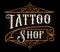 Vintage lettering of tattoo shop