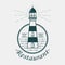 Vintage lighthouse logo rounded by rope or sling